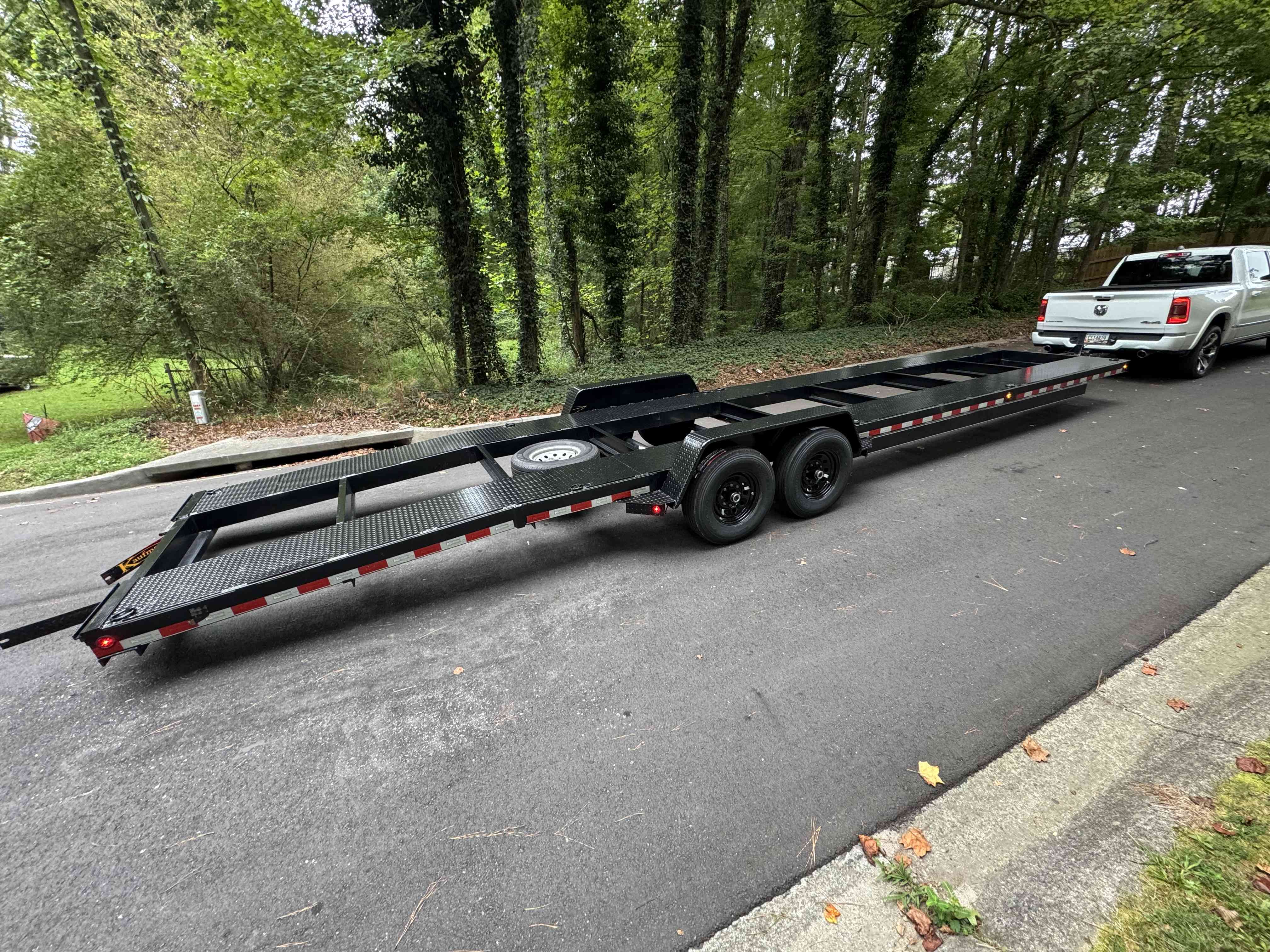 Car Hauler Trailers rental in Snellville, GA - Flatbed and tilt trailers perfect for transporting vehicles, ATVs, and equipment securely.